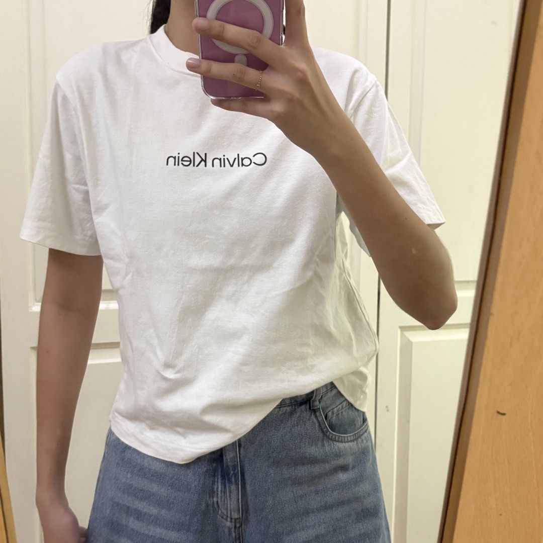 Calvin Klein white t shirt (Category: Shirts) located in Balanga. Submitted by shopflora (Listing ID 1470532165, Image 1). Description: size: xs to m.