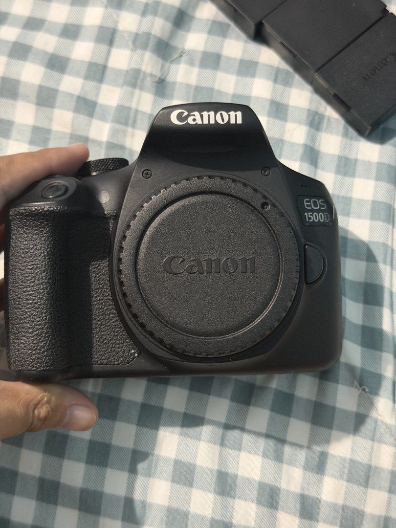 Canon EOS 1500D DSLR Camera with Lens and Accessories (Category: Cameras) located in Manila. Submitted by anddrei26 (Listing ID 1470544908, Image 2). Description: - Canon EOS 1500D DSLR camera body with 18-55mm lens - Perfect starter kit for photography beginners - Includes 3 batteries for extended shooting time - Comes with 2 chargers and power cords - Original camera strap and box included -Has Fungus on kit lens.