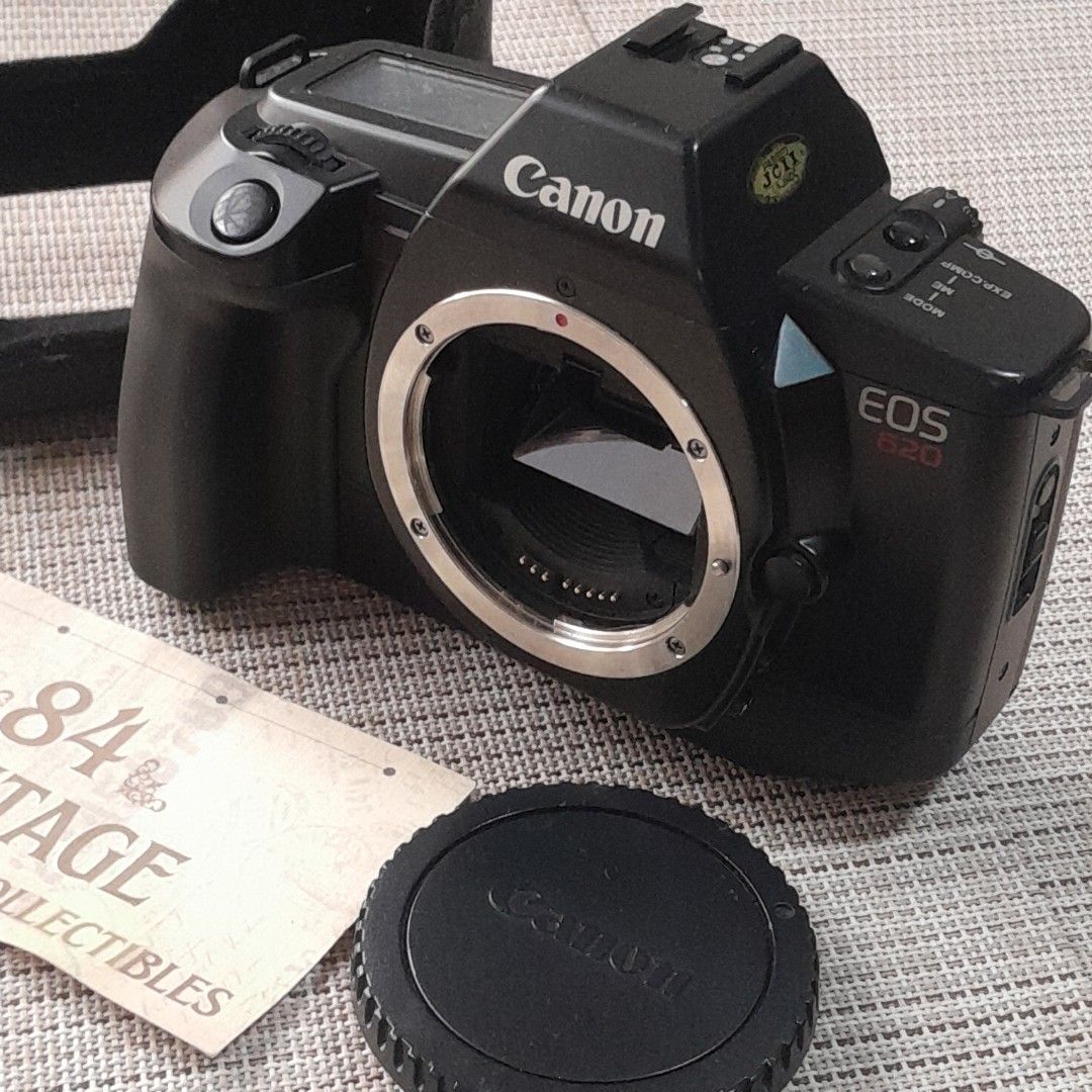 Canon EOS 620 (Category: Vintage Collectibles) located in Las Pinas. Submitted by 84vintage (Listing ID 1470420721, Image 3). Description: Canon EOS 620 with leather half case. One of the most versatile pro secret Canon EOS camera body you might have never heard about. - Flagship Model and Top of the line for this series - Heft and Solid Body -Multiple Exposures - Canon EF Lens Versatility - and one secret Nikon Cameras of this era cannot touch -