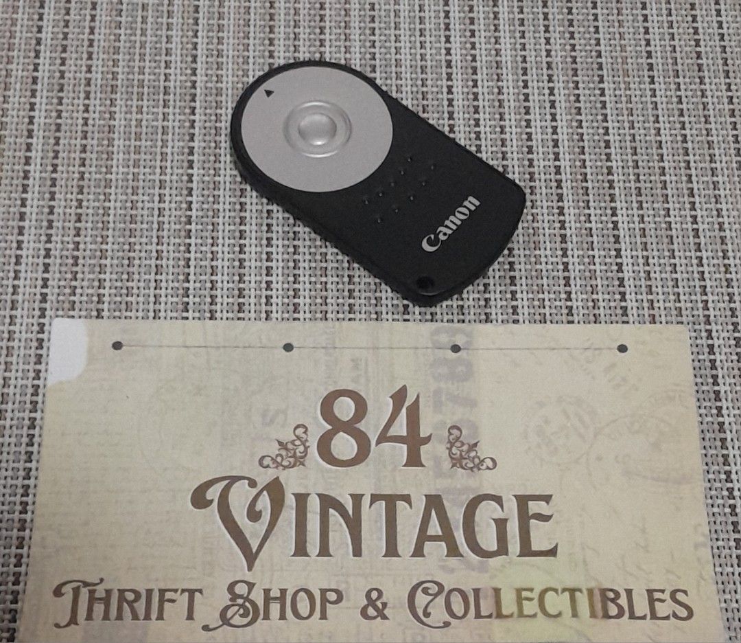 Canon RC-5 Remote Control (Category: Vintage Collectibles) located in Las Pinas. Submitted by 84vintage (Listing ID 1470404481, Image 1). Description: Canon RC-5 wireless infrared remote control. Triggers the camera shutter remotely for photos or starts/stops video recording on compatible Canon EOS DSLRs. Instant shutter release or a 2-second delay option. Uses a small CR2032 button cell battery. Works up to about 5 meters (16 feet) in front of t