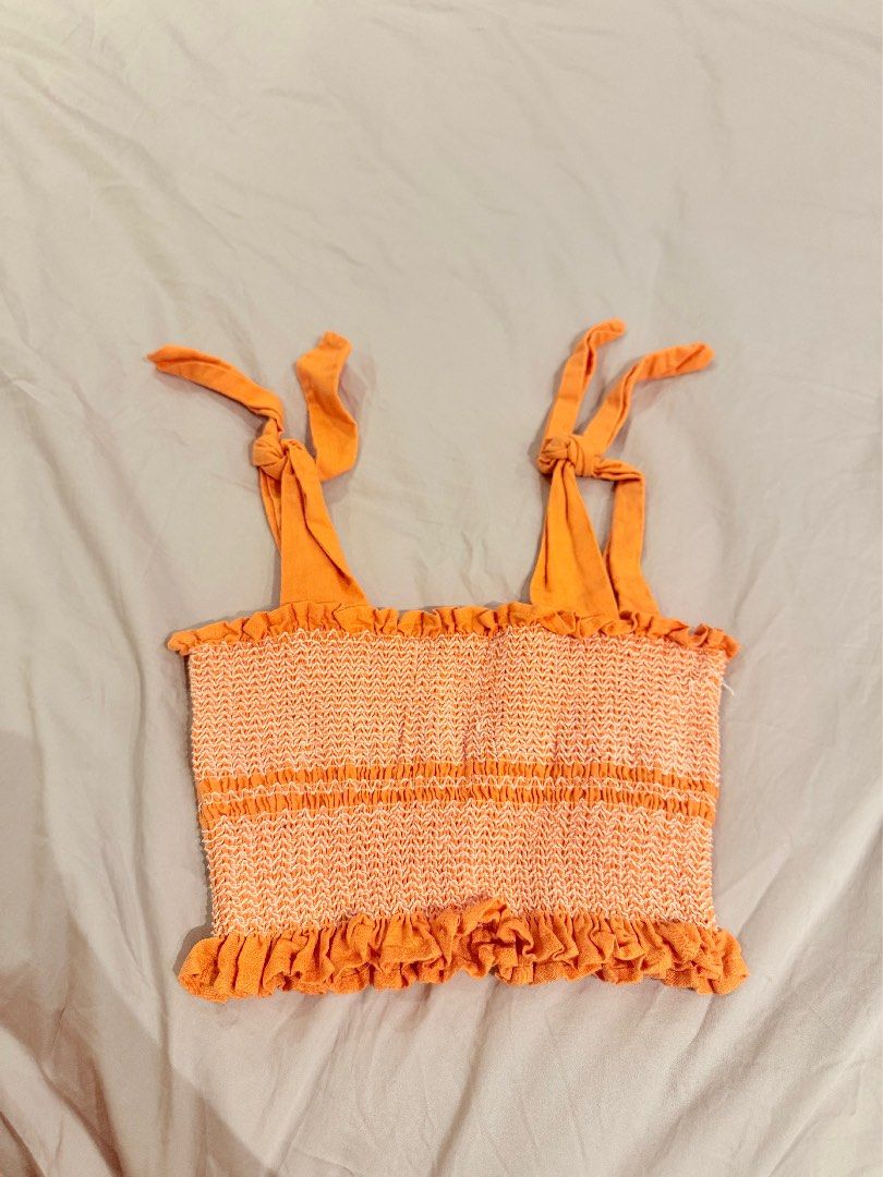 capulet orange smocked crop top with tie straps (Category: Sleeveless) located in Manila. Submitted by shopwt.anna (Listing ID 1470488459, Image 1). Description: size xs-s worn twice only rfs : decluttering .