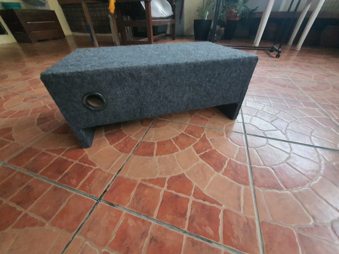 Car Audio Subwoofer in Custom Box Enclosure (Category: Soundbars, Speakers & Amplifiers) located in Dasmarinas. Submitted by njgatchi (Listing ID 1470518645, Image 2). Description: - Custom enclosure with built-in car subwoofer speaker - Sturdy grey carpeted wooden box housing - Convenient side terminal cup connections - Speaker cone features a central logo on the dust cap - Fully wired and ready for immediate vehicle audio setup - Solid build de
