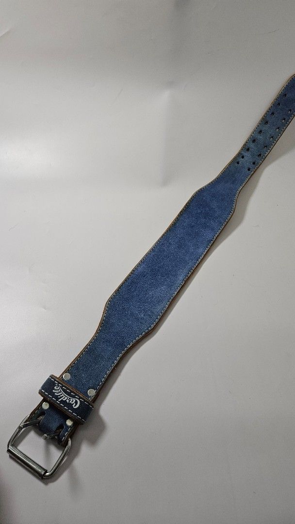 Cardillo Blue Suede Weightlifting Belt (Category: Weights & Dumbbells) located in Alfonso. Submitted by jbcamet (Listing ID 1470401921, Image 1). Description: - Brand: Cardillo - Material: Premium blue suede exterior with black leather inner lining - Closure: Heavy-duty double-pronged steel buckle with sturdy metal rivets - Support: Built-in padded lumbar section designed for heavy lifting - Adjustment: Dual rows of adjustment holes for a secure 