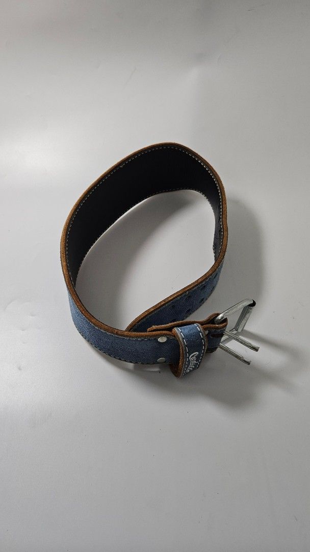 Cardillo Blue Suede Weightlifting Belt (Category: Weights & Dumbbells) located in Alfonso. Submitted by jbcamet (Listing ID 1470401921, Image 2). Description: - Brand: Cardillo - Material: Premium blue suede exterior with black leather inner lining - Closure: Heavy-duty double-pronged steel buckle with sturdy metal rivets - Support: Built-in padded lumbar section designed for heavy lifting - Adjustment: Dual rows of adjustment holes for a secure 