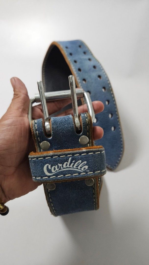 Cardillo Blue Suede Weightlifting Belt (Category: Weights & Dumbbells) located in Alfonso. Submitted by jbcamet (Listing ID 1470401921, Image 3). Description: - Brand: Cardillo - Material: Premium blue suede exterior with black leather inner lining - Closure: Heavy-duty double-pronged steel buckle with sturdy metal rivets - Support: Built-in padded lumbar section designed for heavy lifting - Adjustment: Dual rows of adjustment holes for a secure 