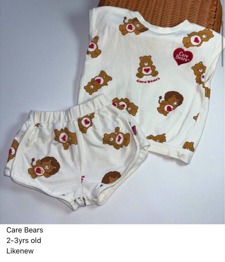 Care Bears Sleepwear Set 2-3yrs (Category: Babies & Kids Fashion) located in Manila. Submitted by miamoire (Listing ID 1470556373, Image 1). Description: - Adorable Care Bears matching top and shorts set - Cream background featuring cute brown bear and lion graphics - Authentic stitched Care Bears logo patch on the chest - Comfortable elastic waistband on the shorts - Made of super soft cotton material - Size: Fits toddlers 2 to 3 years old.