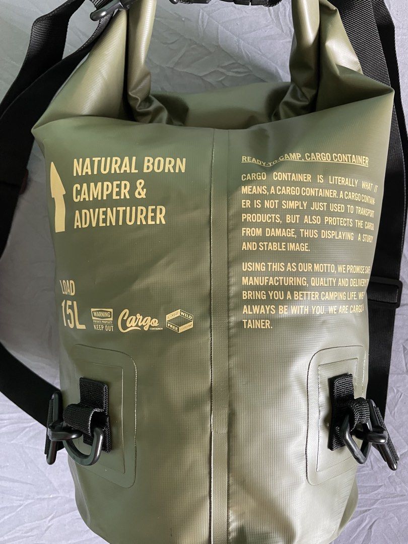 Cargo Container C.C. Shield Drybag 15L Wild Khaki (Category: Backpacks) located in Cagayan de Oro. Submitted by jekdels05 (Listing ID 1470351620, Image 3). Description: - Brand/Model: Cargo Container Dry Bag - Color: Wild Khaki - Capacity: 15 liters - Material: Heavy-duty waterproof fabric - Closure: Roll-top with secure plastic buckle - Features: Adjustable shoulder straps, side D-rings, and front/back printed graphics.