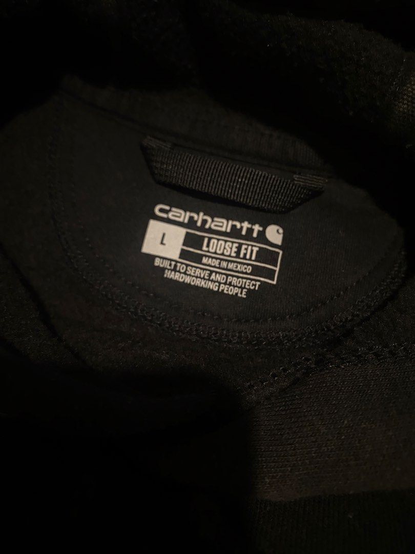 Carhartt Hoodie (Category: Coats, Jackets and Outerwear) located in Talavera. Submitted by adrnvault (Listing ID 1470469716, Image 2). Description: Carhartt Midweight Sleeve Logo Hoodie Issue: minimal disco as workgear Size: large Color rate: 8/10 Color: black Width: 25 Length: 29.