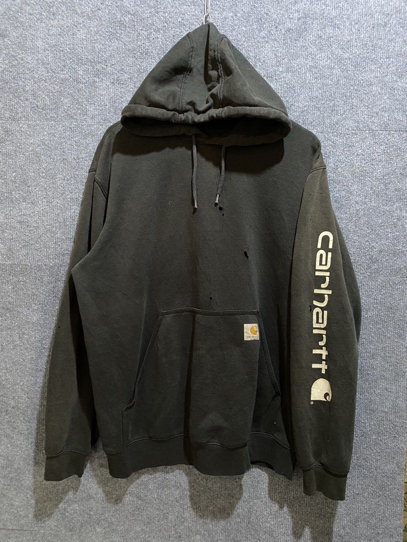 CARHARTT K122 - BLK OG FIT SCRIPT HOODIE (Category: Hoodies) located in Banga. Submitted by thriftingwithher (Listing ID 1470520828, Image 1). Description: 📌 CARHARTT K122 - BLK OG FIT SCRIPT HOODIE💎 ◾DIMES: WIDTH 23.5 X LENGTH 28.5✨ ◾COMPLETE TAGS✨ ◾ISSUE: HAIRLINES/CRACKS, HOLES, MULTI PINHOLES, MINIMAL SCRATCHES IN RIBBINGS✨ ◾COLOR RATE: 9/10✨ ◾WORKWEAR CONDITION✅.