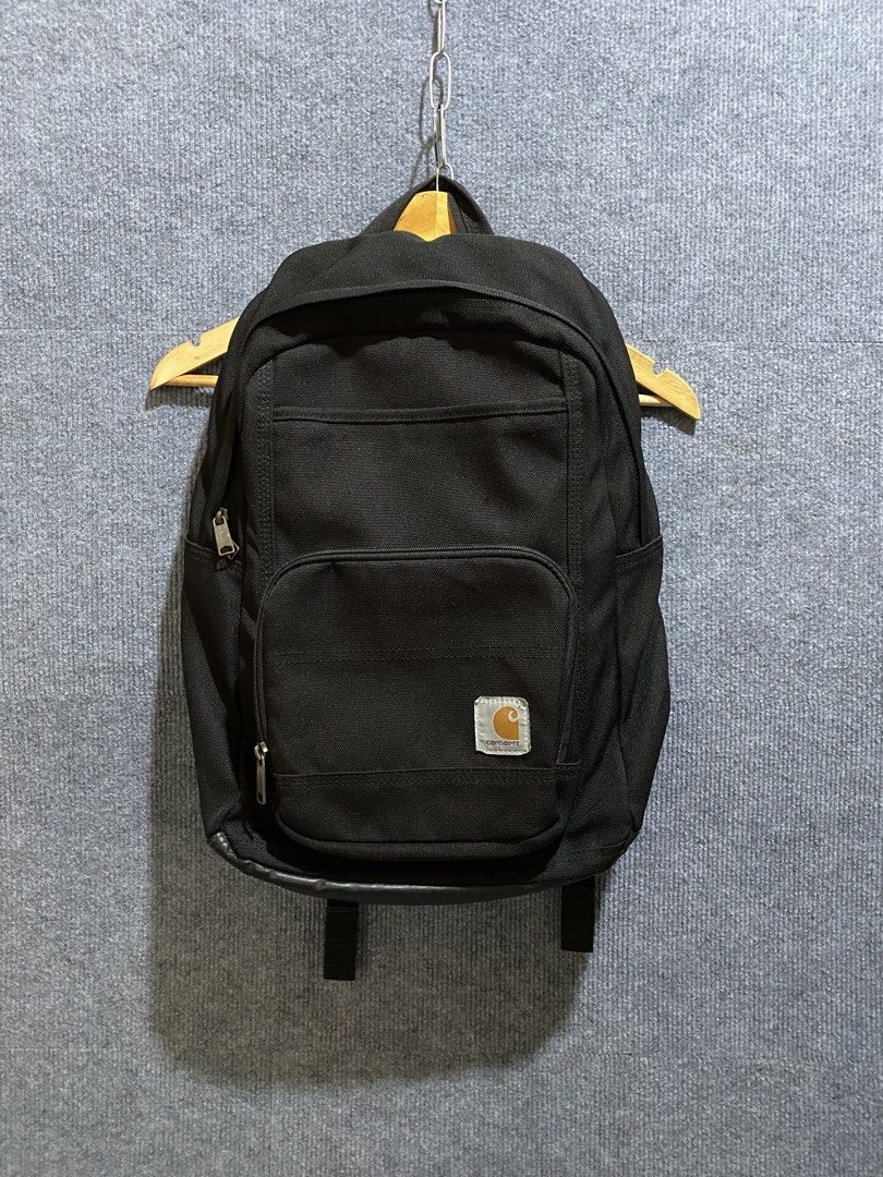 CARHARTT LEGACY CLASSIC WORK BACK PACK (Category: Backpacks) located in Banga. Submitted by thriftingwithher (Listing ID 1470519122, Image 1). Description: 📌 CARHARTT LEGACY CLASSIC WORK BACK PACK💎 ◾DESCRIPTION: * CLASSIC AND STYLISH DESIGN✨ * DURABLE BLACK FABRIC✨ * MULTIPLE ZIPPERED COMPARTMENTS✨ * SIDE POCKETS FOR EXTRA STORAGE✨ * ADJUSTABLE SHOULDER STRAPS✨ * PERFECT FOR SCHOOL, WORK, TRAVEL, OR EVERYDAY USE✨ ◾COMPLETE TAGS✨ ◾ISSUE: VERY MI