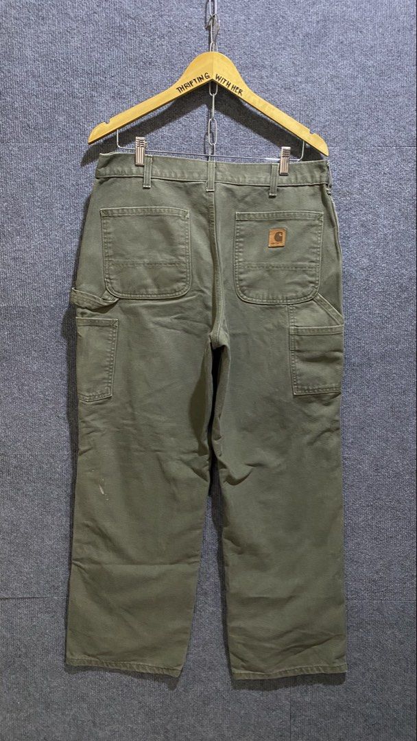CARHARTT MOSS GREEN CARPENTER PANTS (Category: Jeans) located in Banga. Submitted by thriftingwithher (Listing ID 1470519775, Image 1). Description: 📌 CARHARTT MOSS GREEN CARPENTER PANTS💎 ◾DIMES: WAIST 34✨ LENGTH 40✨ THIGH 14✨ LEG OPENING 9.5✨ ◾CUT WASHTAG✨ ◾ISSUE: STAINS, MINIMAL FADING KNEE PART✨ ◾COLOR RATE: 9.5/10✨ ◾EXCELLENT CONDITION✅.
