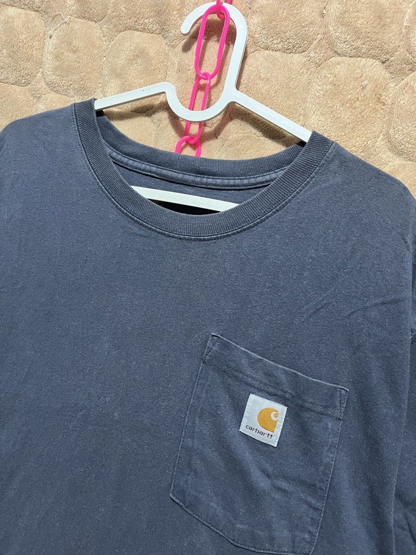 Carhartt pocket tee (Category: Activewear) located in Cebu City. Submitted by thrift.sht (Listing ID 1470459355, Image 2). Description: CARHARTT POCKET TEE NAVY BLUE Size: Large on tag - Oversized fit 21x32 Color: Navy blue 9/10 Condition No issue For only ₱550 DM to mine! Ship via J&T #thriftsht #thrifting.