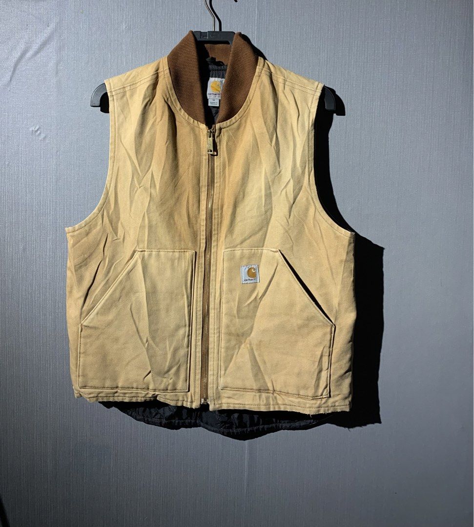 Carhartt Vest Vintage (Category: Coats, Jackets and Outerwear) located in Bacolod City. Submitted by garagehunterbuyandsale (Listing ID 1470488594, Image 2). Description: Carhartt Brown Duck Work Vest (model V01 BRN), featuring a durable cotton duck canvas exterior, a brown corduroy/ribbed collar, a full-zip front, and a quilted lining. Size Medium (Regular fit) or 21 width 25.5 Length & back 27 orig/authentic & vintage 80’s 90’s sign of used! No