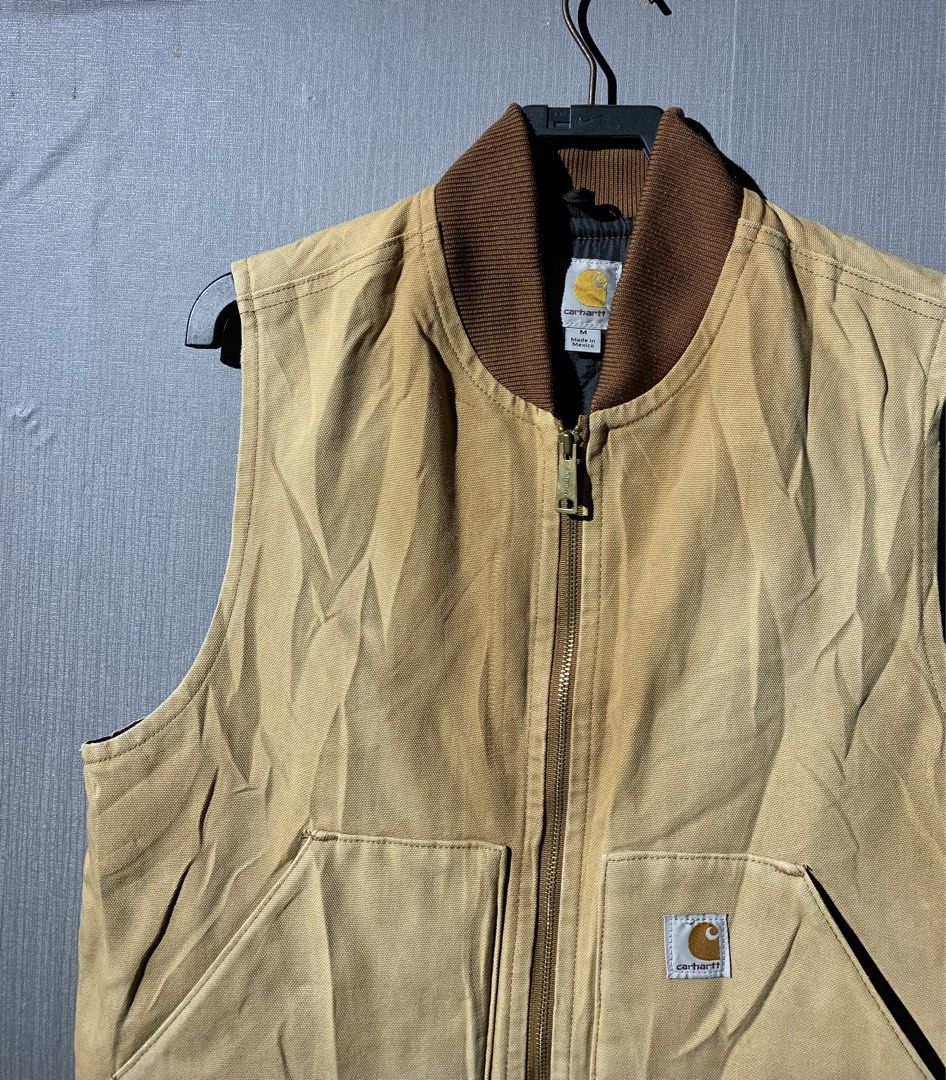 Carhartt Vest Vintage (Category: Coats, Jackets and Outerwear) located in Bacolod City. Submitted by garagehunterbuyandsale (Listing ID 1470488594, Image 3). Description: Carhartt Brown Duck Work Vest (model V01 BRN), featuring a durable cotton duck canvas exterior, a brown corduroy/ribbed collar, a full-zip front, and a quilted lining. Size Medium (Regular fit) or 21 width 25.5 Length & back 27 orig/authentic & vintage 80’s 90’s sign of used! No