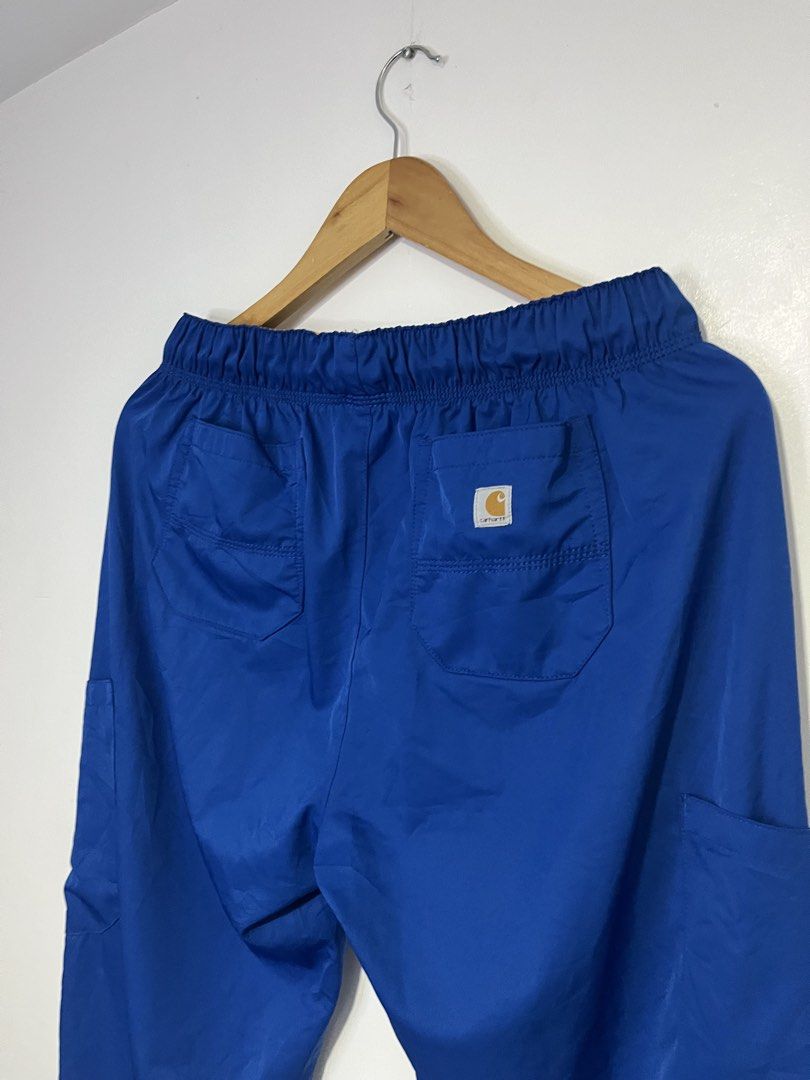 Carousell Carhartt Force Scrub Pants Blue Medium (Category: Jeans) located in Dasmarinas. Submitted by thriftedbygii (Listing ID 1470354260, Image 1). Description: - Brand/Model: Carhartt Force (C53106) - Color: Royal Blue - Size: Men's Regular Medium - Waistband: Elastic with adjustable drawstring - Pockets: Multiple utility pockets and back pockets - Material: 88% polyester, 12% spandex (stretch fabric) - Origin: Made in Bangladesh - Condition:
