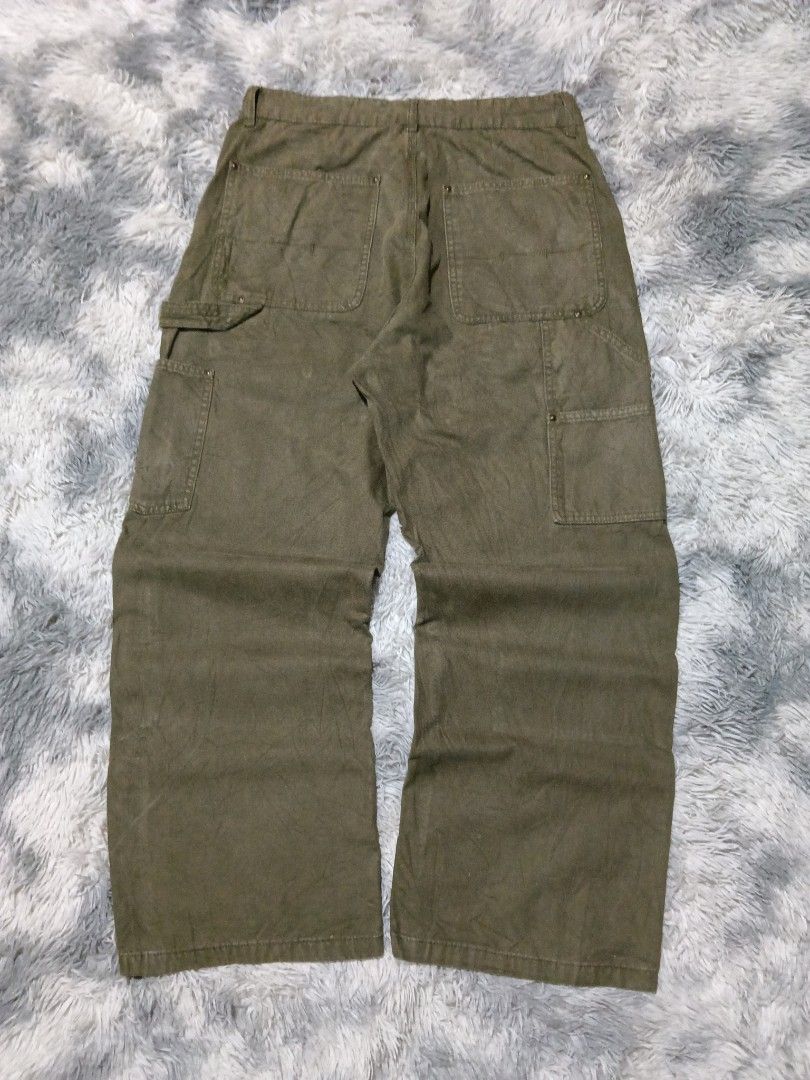 Carpenter double knee (Carhartt vibes) (Category: Jeans) located in San Carlos City. Submitted by wilburstthriftstore (Listing ID 1470504820, Image 2). Description: Carpenter double knee Waist 33-34 Length 41 Hem 11 Canvas material No issue Excellent condition 👌🏾 ₱650 + sf.