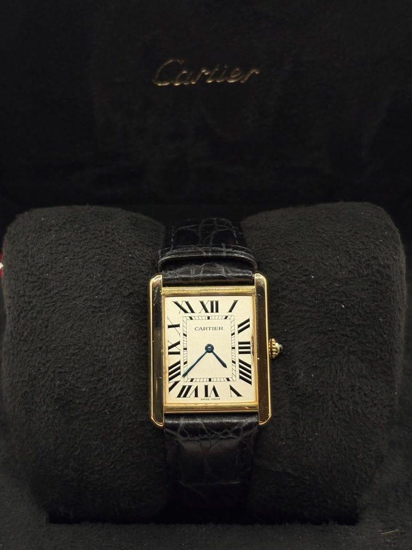 Cartier Tank Large YG (Category: Luxury Watches) located in Pasig City. Submitted by nicoestradaa (Listing ID 1470460112, Image 1). Description: Cartier Tank Large White roman dial 18k Yellow gold case and buckle 33.7mm x 25.5mm Leather strap W1018855 2017 year model 9.8/10 Complete set Open for authentication 350k.