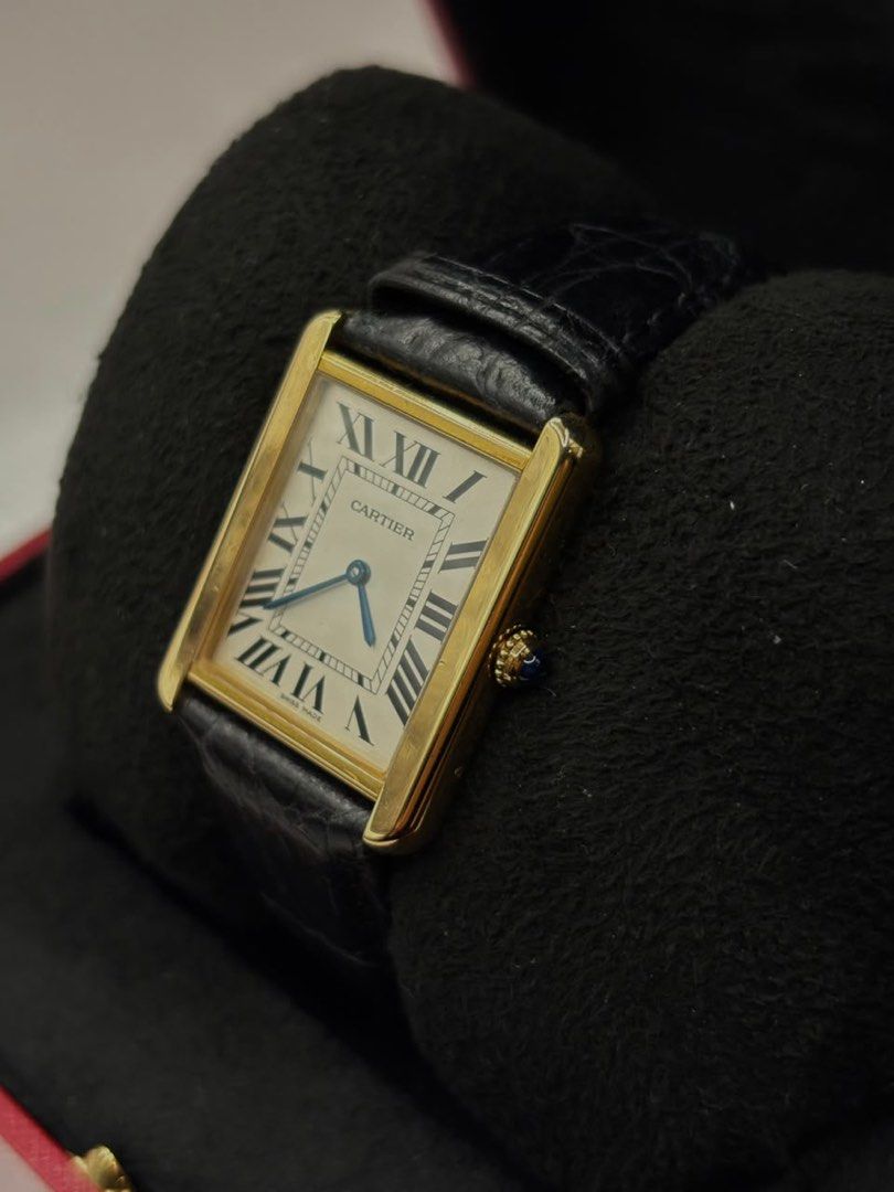 Cartier Tank Large YG (Category: Luxury Watches) located in Pasig City. Submitted by nicoestradaa (Listing ID 1470460112, Image 3). Description: Cartier Tank Large White roman dial 18k Yellow gold case and buckle 33.7mm x 25.5mm Leather strap W1018855 2017 year model 9.8/10 Complete set Open for authentication 350k.