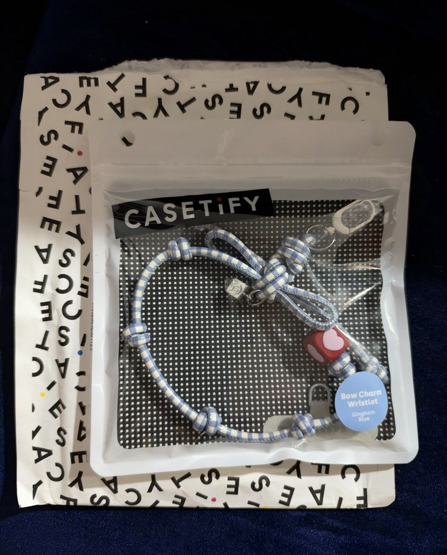 CASETIFY Bow Charm Wristlet (Category: Other Mobile & Gadget Accessories) located in Malabon City. Submitted by ladysharleen (Listing ID 1470418397, Image 1). Description: Items: 1. Bow Charm Wristlet - Gingham Blue 2. Charm Cube - Pink Heart • Open package but unused • 100% money back if proven fake • kakadeliver lang now post agad. See pic for reference. .
