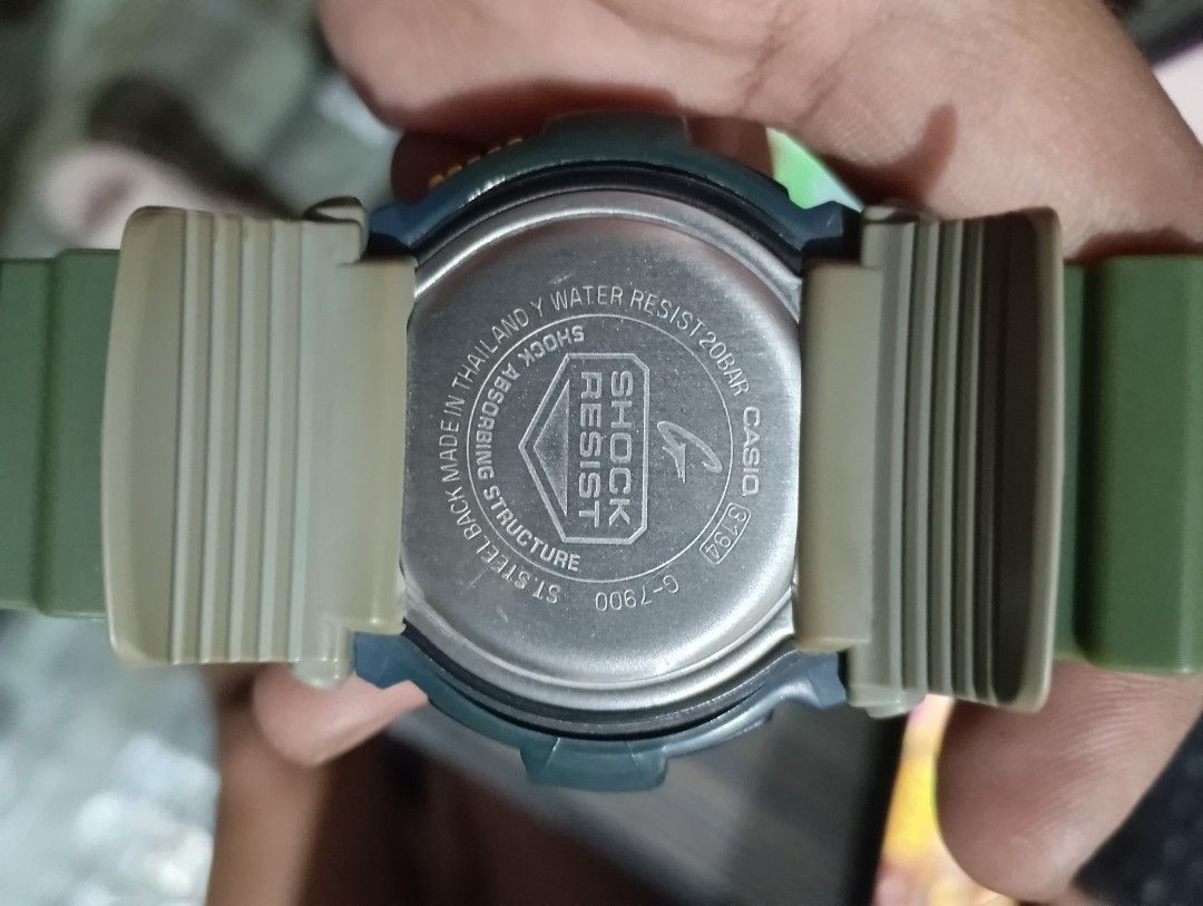 Casio G-Shock G-7900 Green Digital Watch (Category: Men's Watches) located in Manila. Submitted by jcaseanti (Listing ID 1470506725, Image 2). Description: - Model: Casio G-Shock G-7900 (Dark Green & Blue) - Features: Mud-resistant design, large front buttons, and low-temp LCD display - Extras: Moon and tide graphs, WR 20BAR water resistance - Condition: Clean screen, sturdy resin strap, works great - Power: Battery already included.