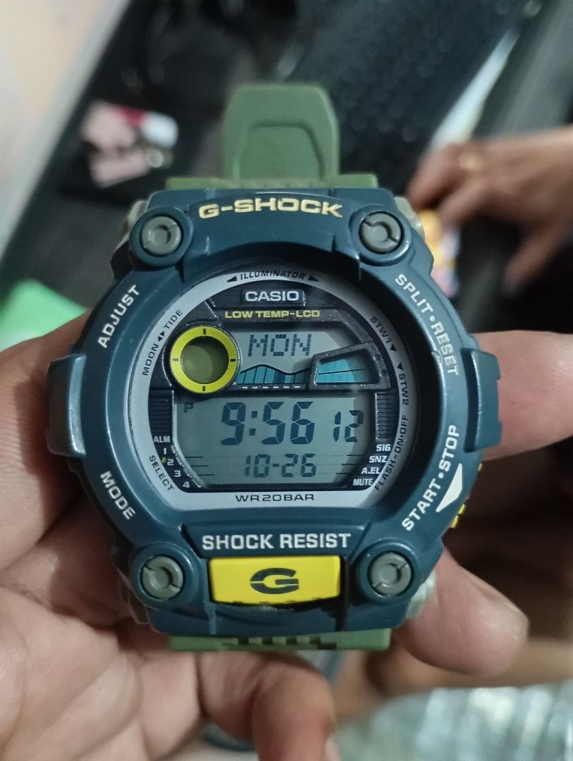 Casio G-Shock G-7900 Green Digital Watch (Category: Men's Watches) located in Manila. Submitted by jcaseanti (Listing ID 1470506725, Image 1). Description: - Model: Casio G-Shock G-7900 (Dark Green & Blue) - Features: Mud-resistant design, large front buttons, and low-temp LCD display - Extras: Moon and tide graphs, WR 20BAR water resistance - Condition: Clean screen, sturdy resin strap, works great - Power: Battery already included.