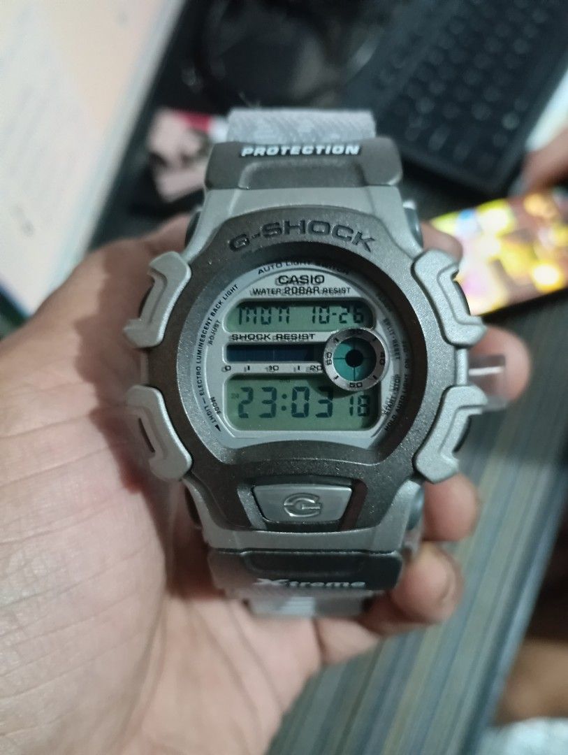 Casio G-Shock X-Treme Digital Watch with Box (Category: Men's Watches) located in Manila. Submitted by jcaseanti (Listing ID 1470506474, Image 2). Description: - Model: Casio G-Shock X-Treme Digital Watch - Color: Grey with branded fabric velcro strap - Condition: Clean and fully tested, minor handling wear only - Features: Shock resistant, 20 bar water resistant, auto light switch, clear digital display - Inclusions: Original black box and instr