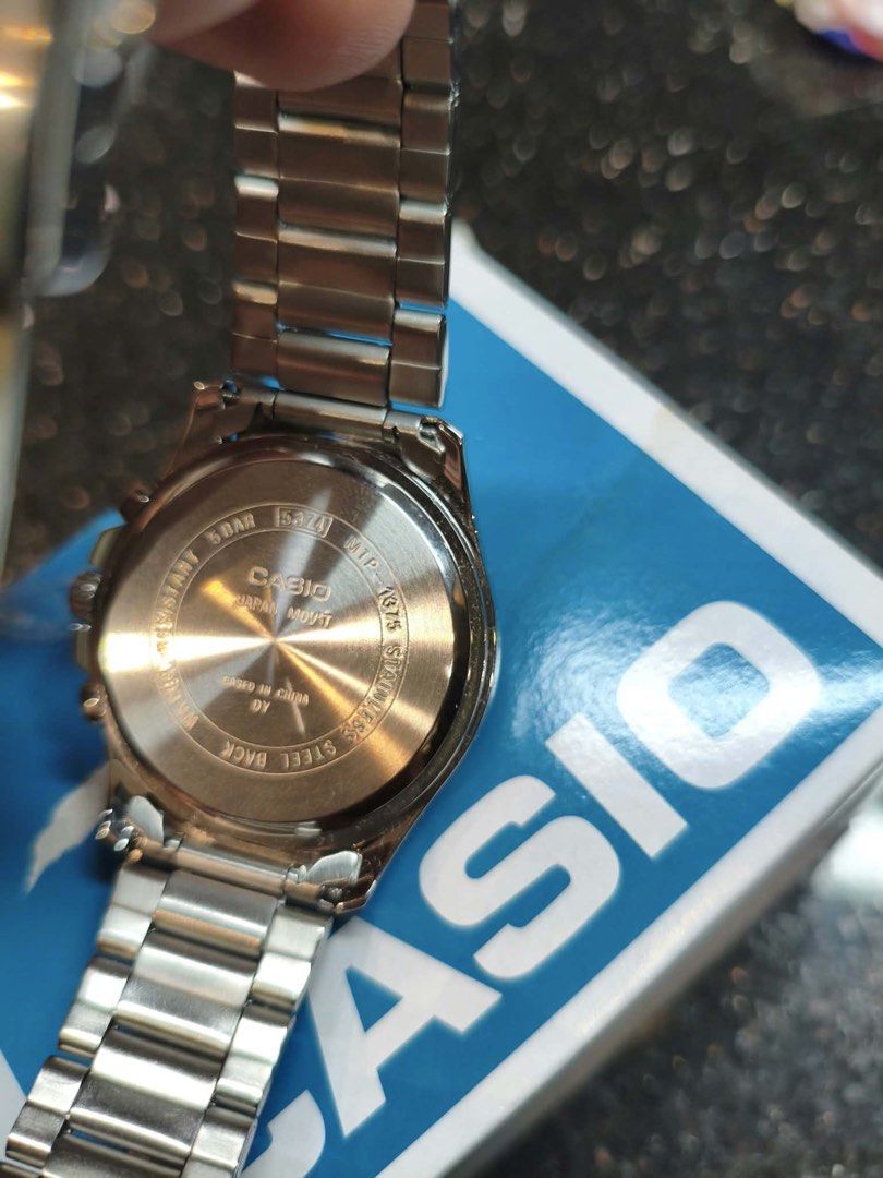 Casio MTP-1375 Stainless Steel Watch (Category: Men's Watches) located in Paranaque City. Submitted by engrmike (Listing ID 1470350185, Image 2). Description: - Model: Casio MTP-1375 - Dial: Textured black with multi-subdials (day, date, and 24-hour time) - Build: Durable stainless steel case and band with a fluted bezel detail - Movement: Reliable Japan movement (cased in China) - Water Resistance: Up to 50 meters - Inclusions: Original box and 