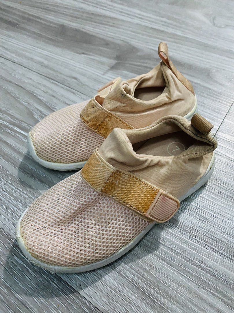 Cat & Jack Pink Mesh Slip-On Shoes (Category: Babies & Kids Fashion) located in Caloocan City. Submitted by lovemyclothes21 (Listing ID 1470455483, Image 1). Description: - Brand/Style: Cat & Jack toddler pink mesh slip-on sneakers - Size: Size 7 (marked on insole and sole, approx. 16.5 cm sole length) - Closure: Elastic strap with velcro for easy on and off - Material: Breathable mesh upper with durable rubber soles - Condition: Moderate wear on