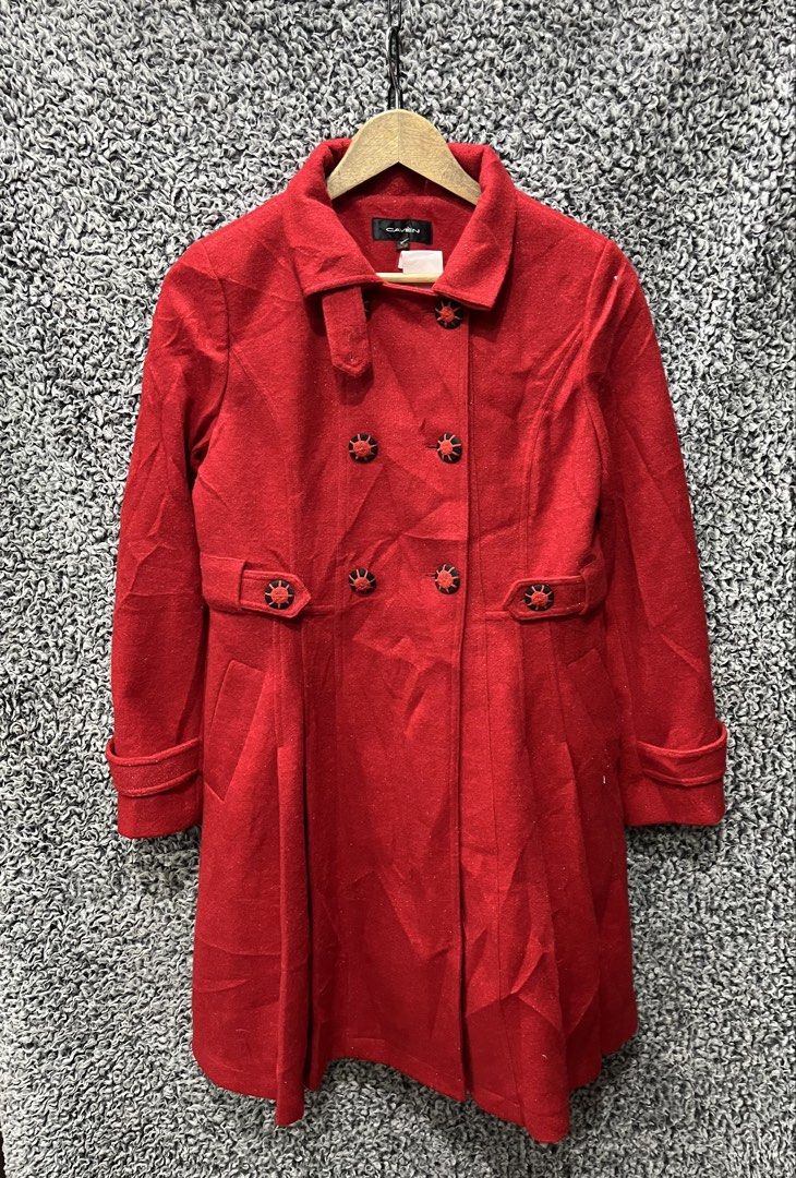 CAVEN double-breasted coat | Size M (Category: Coats, Jackets and Outerwear) located in General Trias. Submitted by zrchustle.604 (Listing ID 1470457749, Image 1). Description: vibrant red, double-breasted coat branded by CAVEN. It features structured lapels, distinct custom-designed black and red accent buttons, a matching waist tab detailing, and a slight A-line flare toward the hemline..