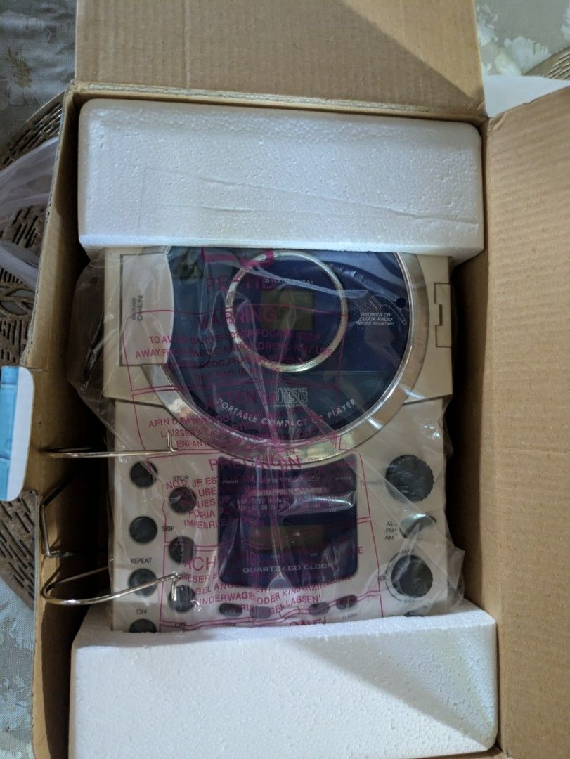 Cd player and radio for shower (Category: Portable Music Players) located in Angeles City. Submitted by renzyboypalaboy (Listing ID 1470556792, Image 3). Description: brand new old stock can be powered by 6 pcs size C battery or 9v power supply (not included) the box is a bit old but the item is sealed not yet opened and played 1k only.