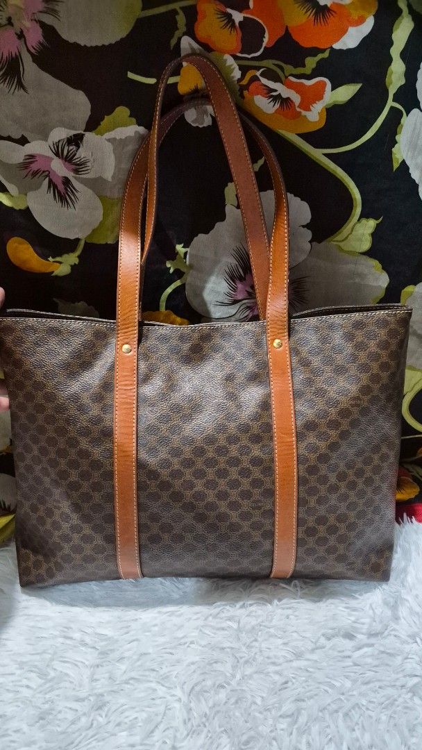 Celine Macadam Brown Monogram Tote Bag (Category: Shoulder Bags) located in Baguio. Submitted by jhaz_bags (Listing ID 1470503424, Image 3). Description: - Brand: Celine - Style: Classic Tote Bag - Material: Brown Macadam Canvas with Tan Leather Trim - Hardware: Gold-tone with Celine Paris detailing - Features: Spacious interior, stored stuffed to hold shape - Timeless vintage piece perfect for everyday use flaw handle.