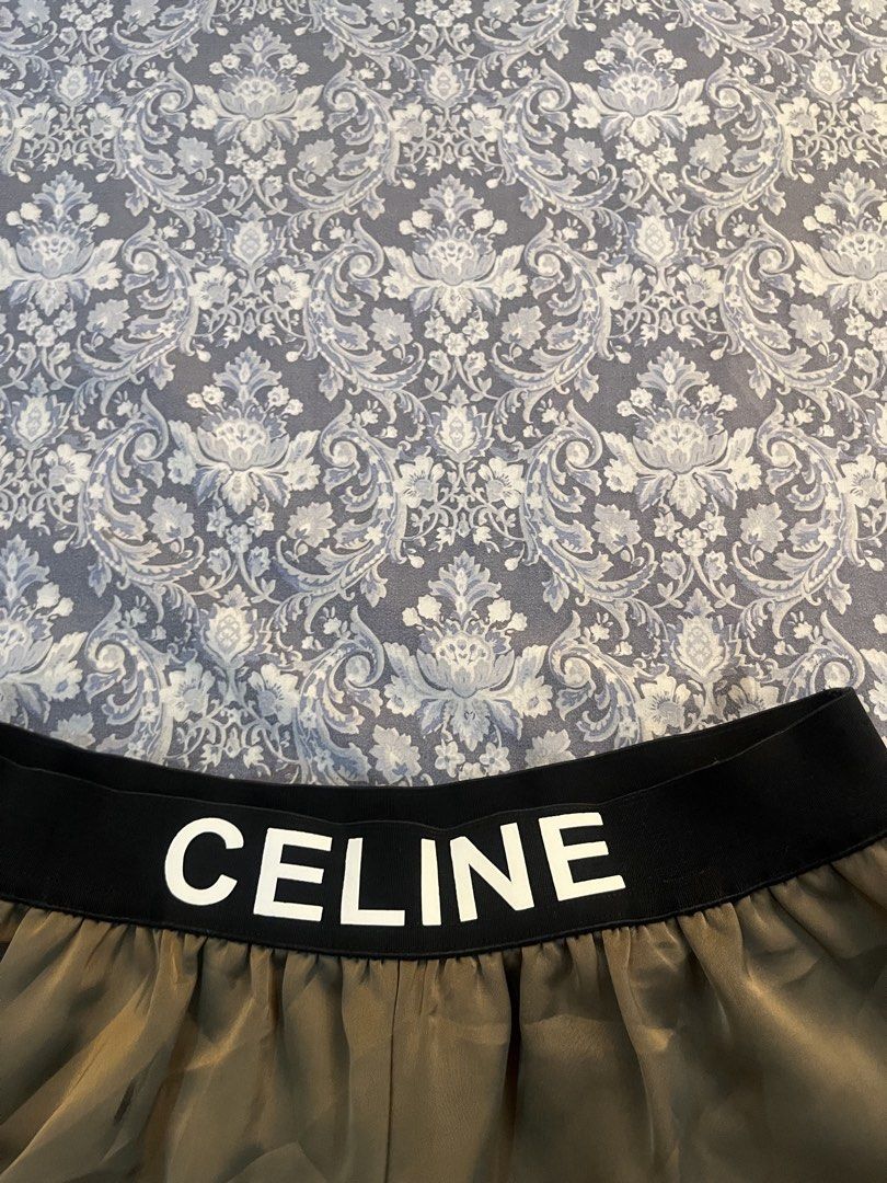 Celine Paris Silk Skirt (Category: Luxury Apparel) located in Batangas. Submitted by gavsandrix (Listing ID 1470360382, Image 2). Description: - Brand: Celine Paris - Color: Neutral taupe - Material: Smooth gathered silk with a nice drape - Waistband: Wide black elastic for a comfortable pull-on fit - Style: Classic designer piece, easy to style for casual or dressy looks - Condition: Clean tag, good overall condition Garterized 25-34.