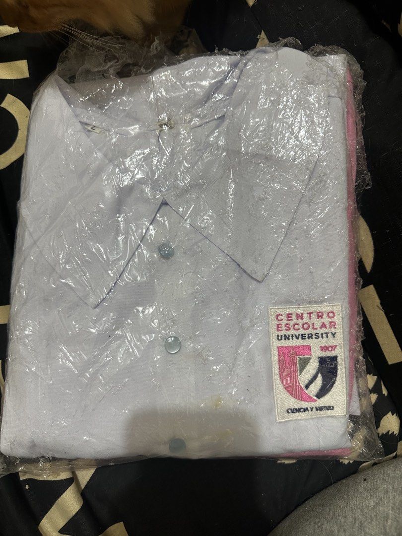 CEU Clinical Uniform Set (Category: Looking For) located in Dolores. Submitted by Ashleyniks12 (Listing ID 1470528127, Image 2). Description: - Official Centro Escolar University uniform set - Brand new and never worn - Still sealed inside original plastic packaging - W Pink Gown, Apron and the white inside rfs: nasobrahan ng bili, nd 4th yr nako now.