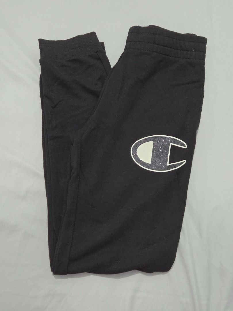 Champion Black Joggers with Glitter Logo (Category: Other Bottoms) located in Bulacan. Submitted by limitless.melai (Listing ID 1470498389, Image 1). Description: waist - can fit to 25 to 27 inches length - 37.5 inches.