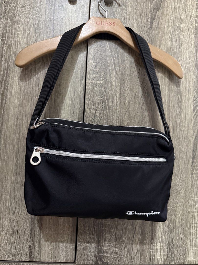 Champion sling bag (Category: Sling Bags) located in Manila. Submitted by mariadarna (Listing ID 1470523665, Image 1). Description: Champion sling bag adjustable strap never use bought in Japan. .
