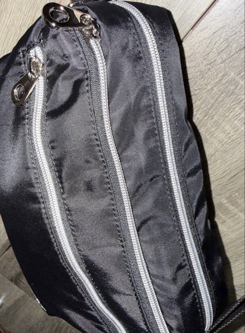 Champion sling bag (Category: Sling Bags) located in Manila. Submitted by mariadarna (Listing ID 1470523665, Image 3). Description: Champion sling bag adjustable strap never use bought in Japan. .