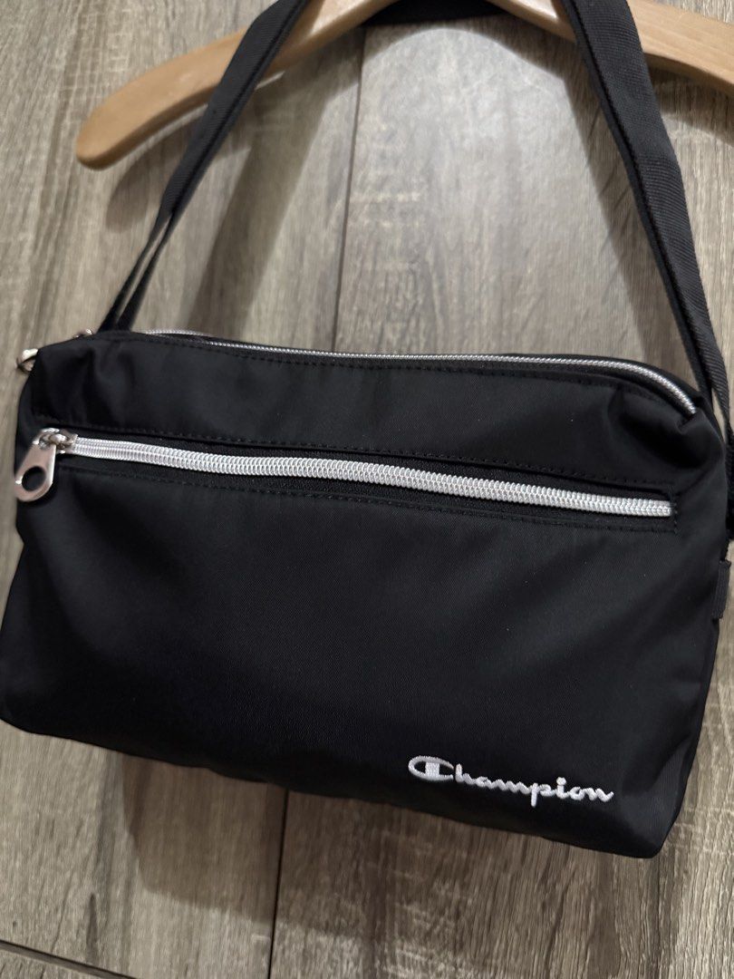 Champion sling bag (Category: Sling Bags) located in Manila. Submitted by mariadarna (Listing ID 1470523665, Image 2). Description: Champion sling bag adjustable strap never use bought in Japan. .