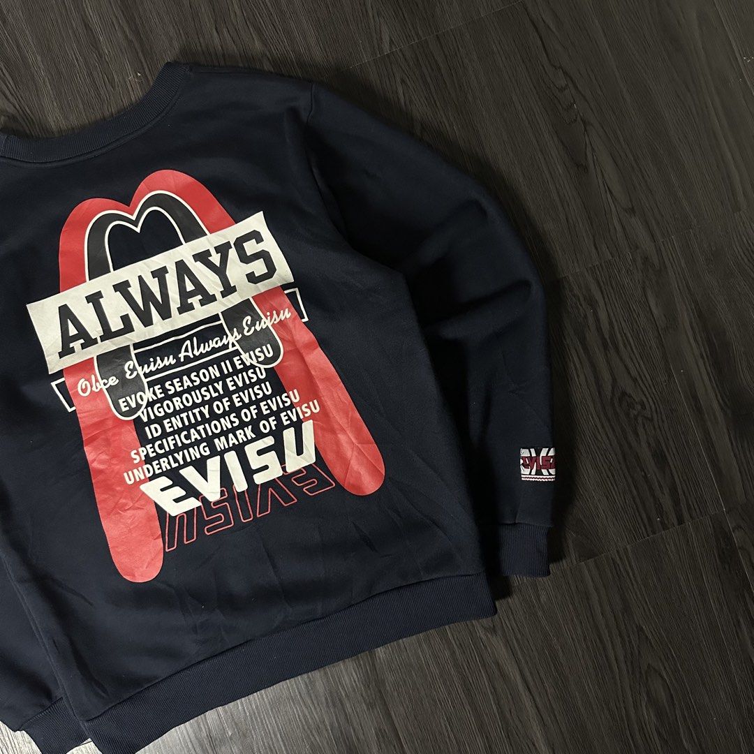 CHAMPION x EVISU (Category: Formal Shirts) located in San Jose del Monte. Submitted by xanthrift2.0 (Listing ID 1470457209, Image 2). Description: EVISU x CHAMPION SWEATER color rate: 10/10 dimes: 21 x 27 (medium) ₱1,499.