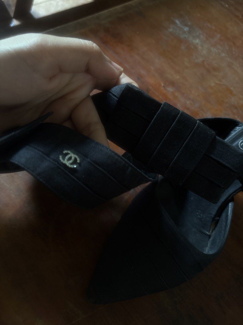 Chanel Black Pointed Toe Heels With Ankle Straps (Category: Heels) located in Quezon City. Submitted by mileena3 (Listing ID 1470437727, Image 2). Description: - Brand: Chanel - Color: Classic Black - Style: Pointed toe heels with unique ribbed multi-ankle straps - Detail: Small embroidered CC logo on the strap - Origin: Made in Italy - Condition: Excellent / Ready to wear.