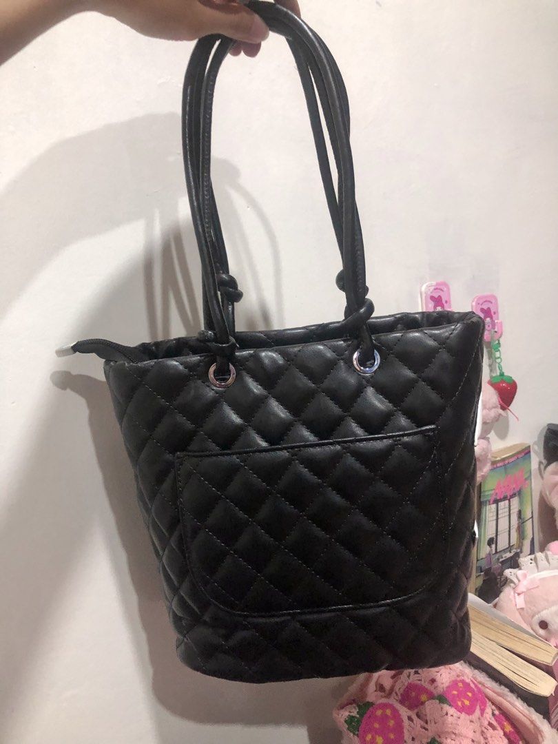 Cambon Black Quilted Tote Bag (Category: Tote Bags) located in Limay. Submitted by blueskyjiminie (Listing ID 1470493786, Image 3). Description: • shows signs of use like minimal creasing • condition 9/10 • ❗️i’m not responsible for the damage caused by the courier ❗️no return/refund .