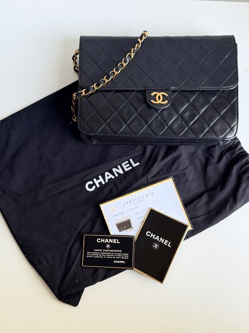 CHANEL Quilted Lambskin Flap Bag, Black (Category: Luxury Bags & Wallets) located in Tarlac. Submitted by official_kiyowo.vintage (Listing ID 1470472788, Image 1). Description: Material: Lambskin leather Hardware: Gold-tone Features: • Diamond-quilted leather • Signature CC detail on the flap • Leather-interwoven chain strap • Classic flap silhouette Condition: Pre-loved and in good overall condition, with visible creasing, surface marks, and sig