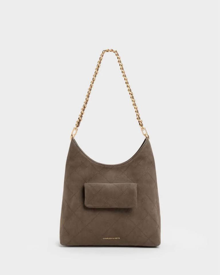 Charles & Keith Quilted Chain Hobo Bag - Suede (Category: Shoulder Bags) located in Pasig City. Submitted by ff.ph (Listing ID 1470471080, Image 1). Description: Hobo Bag Duo Strap and Chain Strap Material Suede Stone Grey color Magnetic closure Size 24x18x11cm With Echodustbag and Serial number Add paperbag plus 80 .