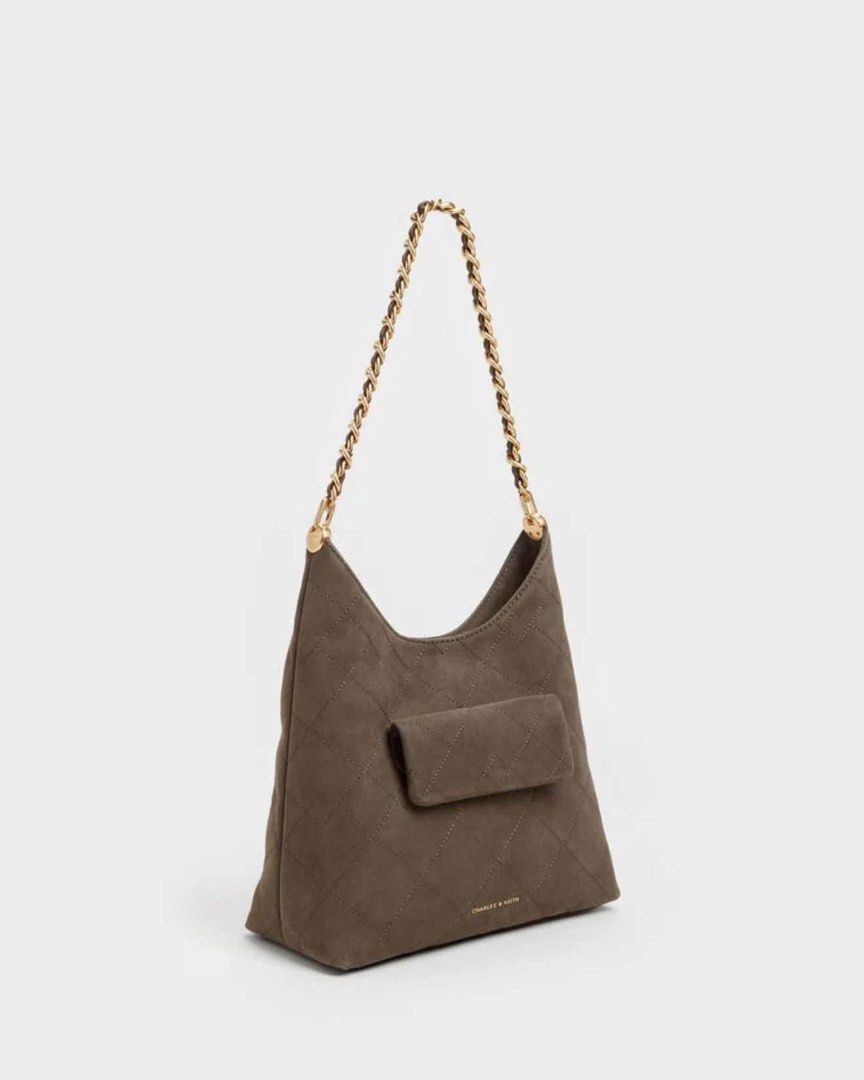 Charles & Keith Quilted Chain Hobo Bag - Suede (Category: Shoulder Bags) located in Pasig City. Submitted by ff.ph (Listing ID 1470471080, Image 2). Description: Hobo Bag Duo Strap and Chain Strap Material Suede Stone Grey color Magnetic closure Size 24x18x11cm With Echodustbag and Serial number Add paperbag plus 80 .