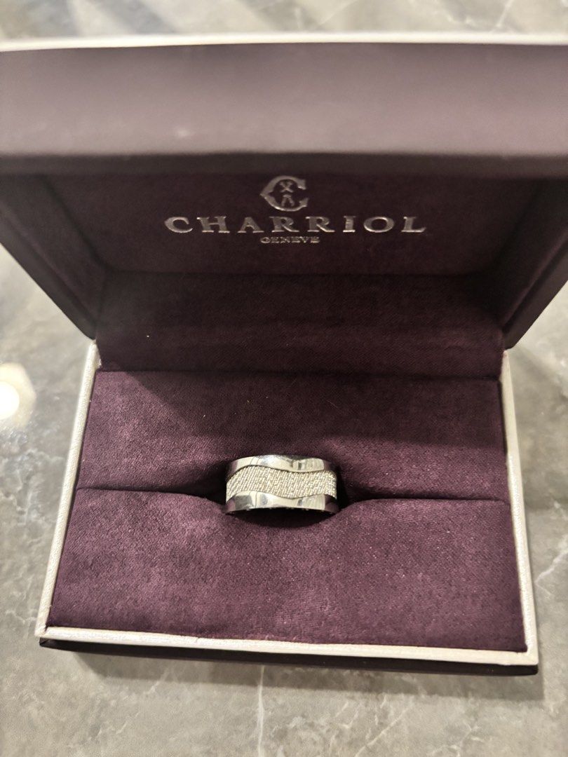 Charriol Geneva Ring with Original Box and Papers (Category: Rings) located in Quezon City. Submitted by mrsindio_bravo (Listing ID 1470522667, Image 1). Description: Charriol Geneva ring in silver tone. Includes branded purple presentation box and authenticity card dated November 19, 2021. Distinct textured cable design around the band. Timeless accessory from the luxury Swiss jewelry house. Stored securely in its original packaging..