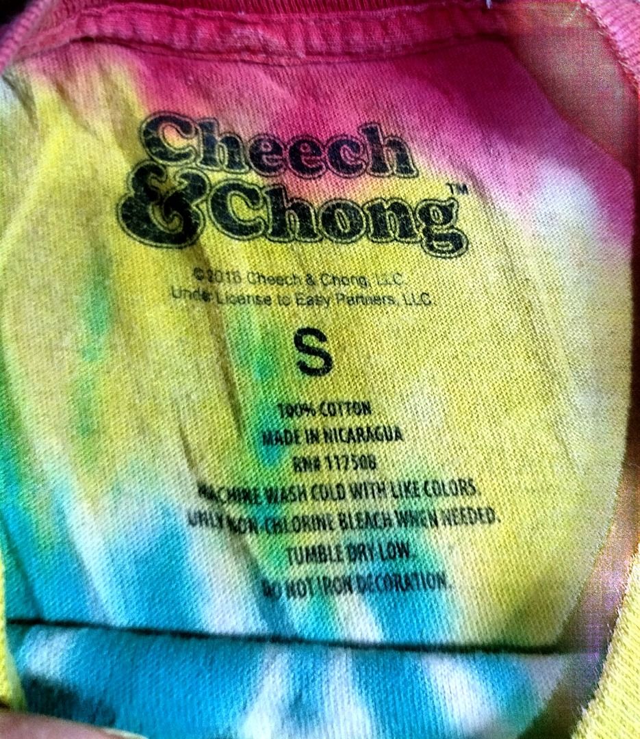 Cheech and Chong Tie Dye T-Shirt (Category: Tshirts & Polo Shirts ) located in Caloocan City. Submitted by safebear_4bdc70 (Listing ID 1470455449, Image 2). Description: - Brand: Official Cheech and Chong - Design: Bright red, yellow, green, and blue tie-dye with front graphic of Cheech and Chong on a grizzly bear (California flag style) - Material: Soft, comfortable cotton - Fit: Short sleeves, crew neck - Condition: Worn a few times, excellent 