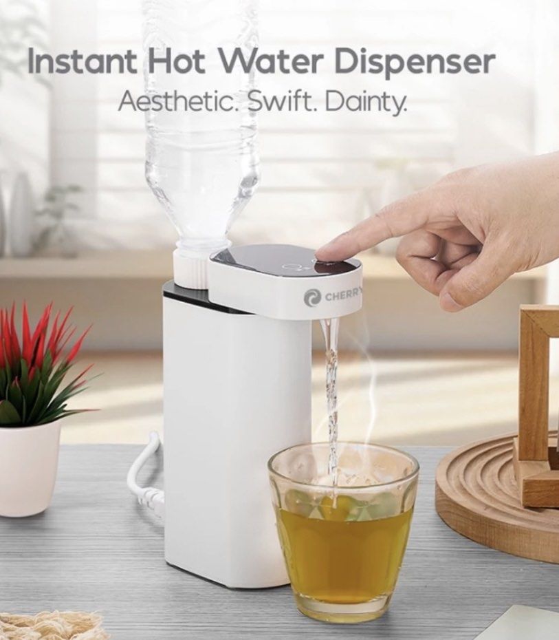 CHERRY Instant Hot Water Dispenser (Compact & Portable) (Category: Water Purifiers & Dispensers) located in Makati City. Submitted by catty.pamy (Listing ID 1470529138, Image 2). Description: - Brand: CHERRY Instant Hot Water Dispenser - Rapid heating in just 2 seconds with one-click operation - 5 adjustable temperature settings to suit your needs - Universal design works with any bottle size - Compact and aesthetic look, perfect for any table or