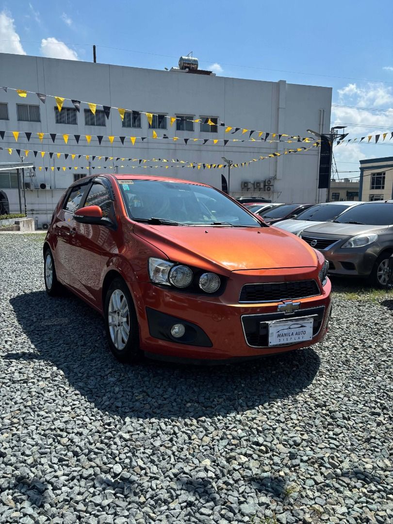 Chevrolet Sonic 1.4 LTZ Hatchback (A) (Category: Used Cars) located in Pasig City. Submitted by pureocean-057512 (Listing ID 1470392614, Image 2). Description: 2015 CHEVROLET SONIC LTZ HATCHBACK AUTOMATIC TRANSMISSION Downpayment: ₱74,700 ✅ ZERO PROCESSING UNTIL NOV 13&14 ONLY ✅ ⚠️ LIMITED SLOTS ONLY ⚠️ Orange 53tkms mileage Automatic transmission Gasoline engine 1 ending plate PLEASE CALL HANNAH: 0961.581.3937 𝐒𝐡𝐨𝐰𝐫𝐨𝐨𝐦 𝐥𝐨𝐜𝐚𝐭𝐢𝐨𝐧: 