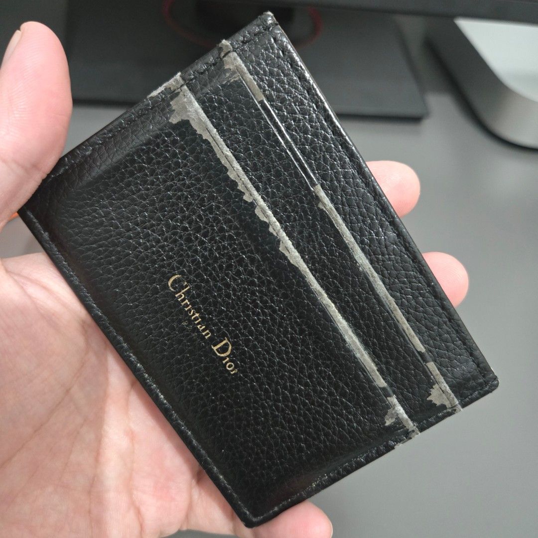 Christian Dior Card Holder (Category: Wallets & Card Holders) located in Quezon City. Submitted by flipandfind (Listing ID 1470490295, Image 2). Description: authentic gwp christian dior card holder - well used, pealing leather, check photos for the condition - sold as is P 1500.