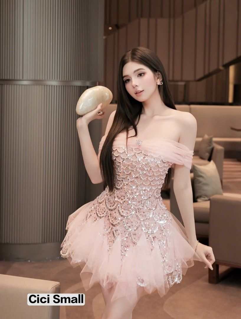 Cici Small Pink Sequin Off-Shoulder Mini Dress (Category: Dresses) located in Las Pinas. Submitted by lodss91453 (Listing ID 1470360430, Image 1). Description: - Color: Pink - Size: Small - Design: Sparkly sequins with scalloped patterns and voluminous layered tulle skirt - Neckline: Strapless sweetheart with sheer draped fabric on the arms - Closure: Smooth back zipper - Condition: Worn once, freshly dry-cleaned, no loose threads or missing sequ