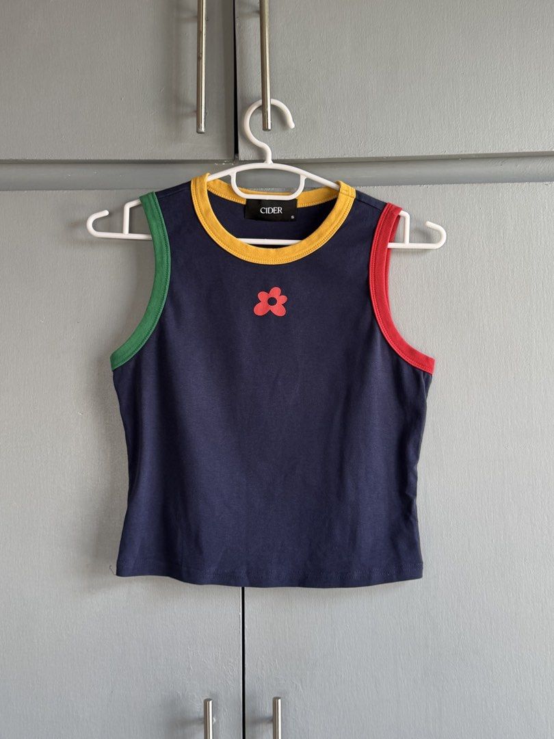 Cider Navy Blue Tank Top (Category: Sleeveless) located in San Juan City. Submitted by itemsfromkam (Listing ID 1470452184, Image 1). Description: • S on tag • cute colorful accents, stretchable, flattering, cropped • actual ww pic at the end.